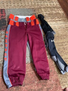 2 pairs of women’s softball pants and under armour socks